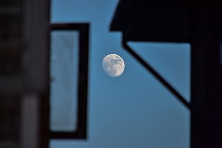 A view of the Strawberry Moon as it rises. The June super-moon is commonly known as the Strawberry Moon named by Native American tribes for the strawberries harvested in North America according to the Farmer's Almanac.