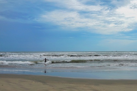 A boy seen swimming at an almost empty beach of Cox's Bazar as all the tourist spots remain closed due to a nationwide lockdown at shahin point in Cox's Bazar tourist spot.
Covid-19 coronavirus lockdown has brought the country's most visited tourism spot to a knee.