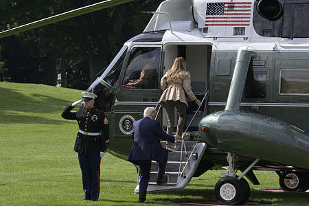 US President Donald Trump and First Lady Melania Trump seen entering an helicopter, from White House en route to Kerrville, Texas, at South Lawn/White House in Washington DC, USA.