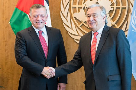 King Abdullah II bin Al Hussein of Jordan and Antonio Guterres, Secretary-General of the United Nations check hands at the United Nations in New York City.