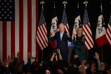 Democratic presidential candidate, Joe Biden, with his wife, Jill Biden at his side addresses a crowd of supporters and the media on caucus night at Drake University. The results of the Iowa Caucuses were delayed but Biden spoke to the crowd gathered.