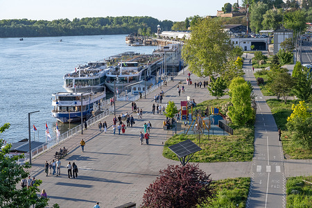 People seen walking along the Water Front Development Project beside River Sava .