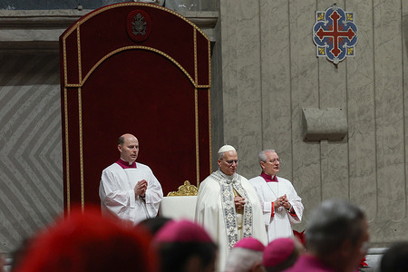 Pope Leo XIV seen presiding over the celebration of First Vespers and Te Deum of thanksgiving for the past year at the Altar of the Confession in St. Peter's Basilica.