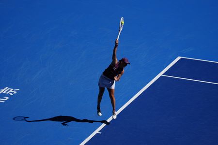 Iga Swiatek of Poland seen in action against Donna Vekic (not in view)of Croatia during Women's Singles Round of 32 match on day six of China Open at the National Tennis Center.