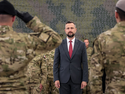 The head of the Ministry of National Defense, Deputy Prime Minister of Poland, Wlodzimierz Kosiniak-Kamysz, salutes Polish servicemen as they participate in the ceremony of handover of duties of the Commander of the Special Forces Component.
