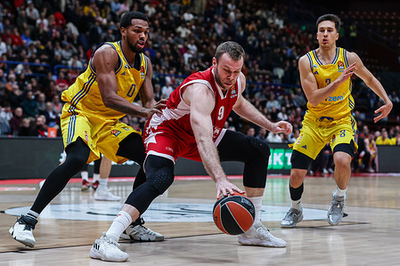 Nicolo Melli #9 of EA7 Emporio Armani Milan (C), Jonas Mattisseck #9 of Alba Berlin (L) and Matteo Spagnolo #3 of Alba Berlin (R) seen in action during Turkish Airlines EuroLeague 2023/24 Regular Season Round 20 game between EA7 Emporio Armani Milan and Alba Berlin at Mediolanum Forum. Final score; EA7 Milan 82 | 76 Alba Berlin.