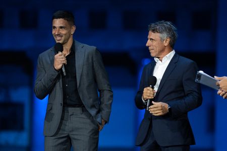 Giovanni Simeone (L) and Gianfranco Zola (R) perform Live at Piazza del Plebiscito during the "Una serata di stelle per PUPI" charity event. “Una serata di stelle per PUPI” celebrates the 25th anniversary of the PUPI Foundation with an event dedicated to sports, music, and solidarity. At the heart of the evening are solidarity and the commitment to supporting projects focused on childhood, adolescence, and social inclusion, with a special focus on initiatives active in various areas of the city of Naples.