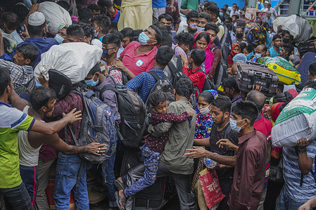 People crowded at Dhaka River Port leaving the capital for their home villages to celebrate Eid Al Adha or the 'Festival of Sacrifice'.
