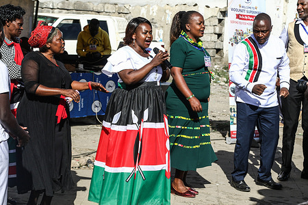 Gospel musician Ann Maina wearing a dress with colors of the Kenyan flag is joined by others to perform during an event to call for peace as Kenya prepares for elections. Peace Campaign in Nakuru as Kenya prepares for the general election scheduled on August 9, 2022.