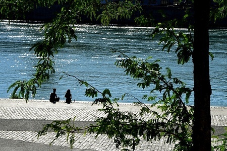 Two young women seen along the Saone River in the city of Lyon.