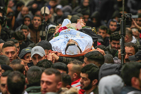 (EDITOR'S NOTE: Image depicts death)
Mourners carry a body of one of the two Palestinians who were shot dead by the Israeli army while they were being pursued after they opened fire on a military post, in the town of Jaba, near Jenin, in the West Bank.