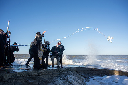 Archbishop Nikitas of Thyateira and Great Britain throws the white cross into the sea. The 61st annual Blessing of the Sea took place. The event is a Greek Orthodox celebration at Epiphany marking the baptism of Christ. Margate was chosen for the honour in the mid-20th century because there is a large community of Greek Cypriot residents in the town.
