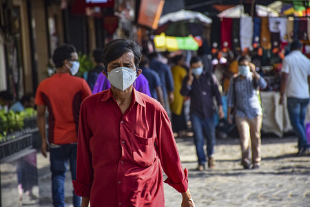 KOLKATA, INDIA - MARCH 20, 2020:
Commuters wear face masks as a precaution against the spread of Coronavirus in Kolkata.
India has reported four deaths and 223 cases so far.