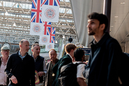 Flags celebrating the upcoming Coronation of Britain's King Charles III are seen at Waterloo train station in London, before the king's coronation on May 6th.