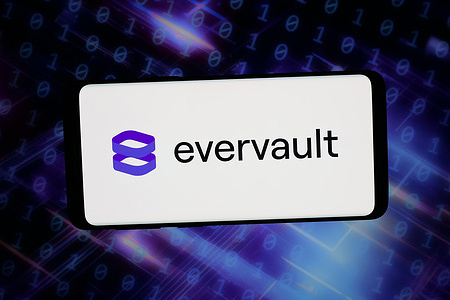 In this photo illustration, the logo of payment security company Evervault Inc. is displayed on a smartphone in front of abstract background on computer screen.