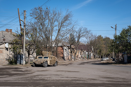 Military car on Kharkivska street. On 10th September 2023, the Ukrainian authorities announced the obligatory evacuation of settlements in the area of Kupiansk, on the east bank of the river Oskol — including parts of Kupiansk itself. Less than a year after being liberated by the Ukrainian army, the town and its suburbs, being an important railway and road junction connected directly to Russia itself, again became an important military objective, endangered by the Russian offensive.