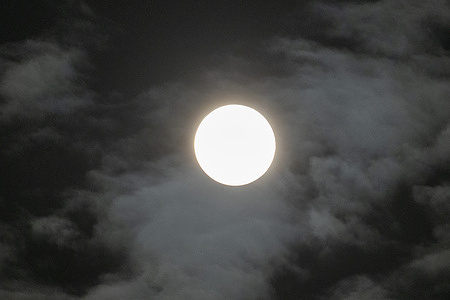 The full moon, known as the Wolf Moon, rises in the night sky. The Wolf Moon marks the first full moon of the year and is the last supermoon until November 2026, according to astronomers.