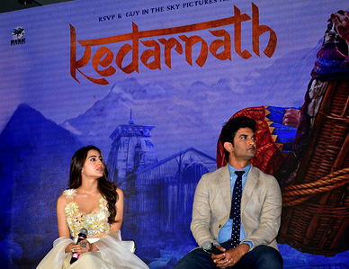 Actor Sushant Singh Rajput and Sara Ali Khan pose for photos on the trailer launch of their upcoming film Kedarnath at hotel JW Marriott Juhu in Mumbai.