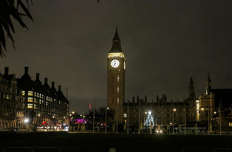 A view early morning showing the Elizabeth clock tower commonly called ‘Big Ben’ with a Parliament Christmas tree in lights and Portcullis House on the far left as viewed from Parliament Square.