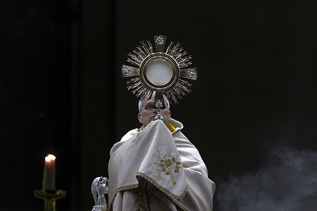 Pope Leo XIV presides over the rite of the Adoration of the Blessed Sacrament after leading a rosary for peace during a prayer vigil for the Jubilee of Marian Spirituality in St. Peter's Square at the Vatican