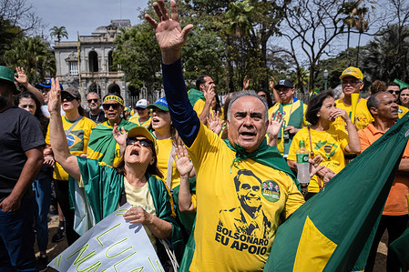Supporters of the current president of Brazil and candidate for re-election, Jair Bolsonaro, pray during a campaign rally on Brazil's 200th Independence day events. People dressed in Brazilian flag colors gathered at Praça da Liberdade in Belo Horizonte, Minas Gerais State capital in Brazil.