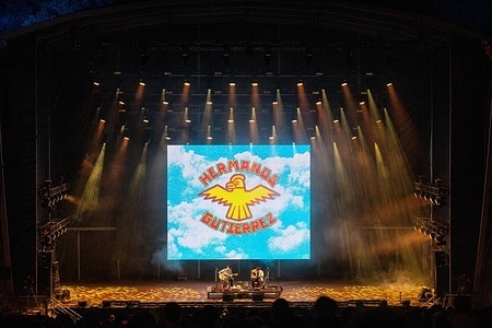 Alejandro Gutiérrez and Estevan Gutiérrez, guitar duo of the Swiss‑Ecuadorian instrumental Hermanos Gutiérrez, perform together on stage during the Vodafone Paredes de Coura.