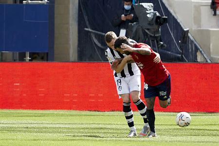 Carlos Clerc Martínez (defender; Levante UD) and Ruben García (midfielder; CA Osasuna) in action during the Spanish La Liga Santander match between CA Osasuna and Levante UD at Sadar stadium.
(Final score: CA Osasuna 1-3 Levante UD)