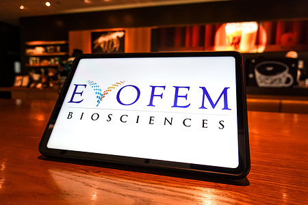 In this photo illustration, the Evofem Biosciences logo is displayed on the screen of a tablet.