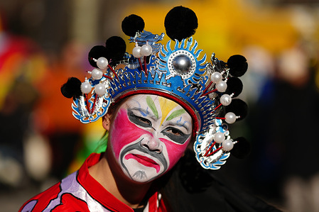 Dancers perform during a procession Lunar New Year celebrations of Spring Festival