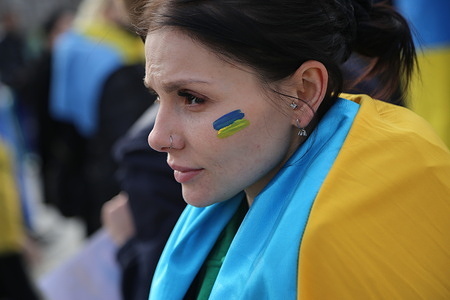 A protester with a Ukrainian flag on her face is seen during the demonstration against Russian aggression.
On the third day of the attack of Russian military troops on Ukraine, Ukrainian citizens and anti-war protesters gathered at Beyazit Square in Istanbul to protest against Russia and Russian President Vladimir Putin.