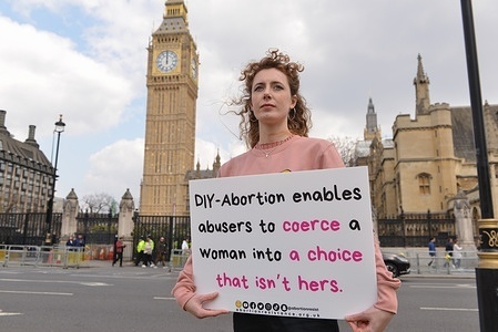 Protester holds a placard expressing her opinion during the demonstration. Anti abortion pro-life organisation, Abortion Resistance staged a protest at Parliament Square against coerced abortions.