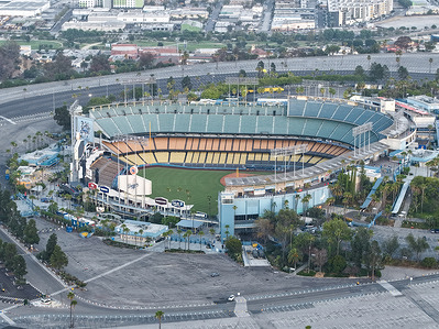 An aerial view of Dodger Stadium and surrounding parking lots in Los Angeles. The stadium is home to the Los Angeles Dodgers.
