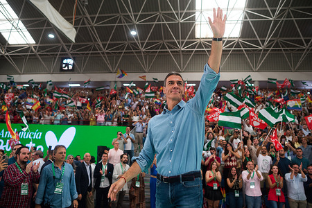 Spanish Prime Minister Pedro Sanchez (C) greets supporters during a rally to mark the start of political season in Malaga. The President of the Spanish Government begins the political season in Málaga, marked by the PSOE's "Spanish Socialist Workers' Party" decline and the call for Andalusian regional elections in 2026.