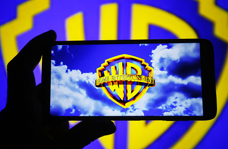 In this photo illustration, a Warner Bros. Entertainment Inc. (WB) logo is seen on a smartphone screen.