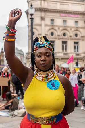 A protester makes a gesture during the demonstration.Extinction Rebellion (XR) protesters took to the Streets protesting against climate change, global warming, and plans to target the root cause of the climate and ecological crisis and to demand the government divest from fossil fuel companies.