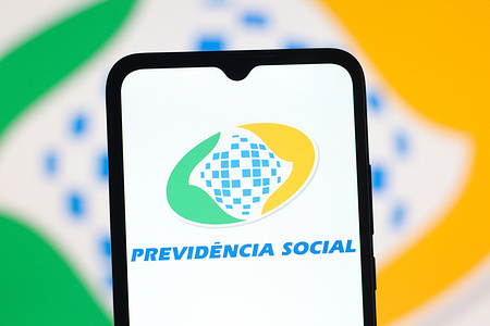 In this photo illustration, the Previdência Social (INSS) logo is seen displayed on a smartphone screen.