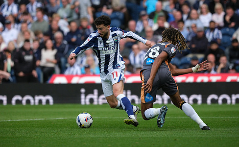 Mikey Johnston of West Bromwich Albion and Dion Sanderson of Derby County are seen in action during the EFL Championship Football match between West Bromwich Albion versus Derby County at The Hawthorns. Final Score; West Bromwich Albion 0-1 Derby County