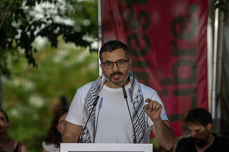 Murad Odeh, Palestinian journalist, speaks during the international event "Stop the Genocide! Free Palestine!" held in the gardens of the Temple of Debod in Madrid, Spain. Sumar and the Left group organized an international event under the slogan "Stop the Genocide! Free Palestine!" to demand a response to the plight of the Palestinian people and hold the Israeli government accountable.