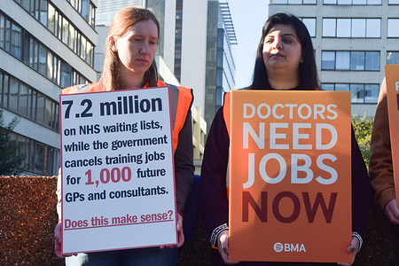Resident doctors, previously known as junior doctors, stand with placards at the British Medical Association (BMA) picket outside St Thomas' Hospital as they stage a fresh round of strikes over pay.