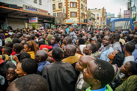 Members of the public and followers of Televangelist Ezekiel Odero, head of the New Life Prayer Centre and Church, congregate outside Maximum Miracle Center Church in downtown Nairobi where he was invited to lead a prayer session. Due to the immense turnout and for security reasons, the prayer meeting had to be rescheduled. The overflowing crowd filled the church and spilled into the street affecting business and normal flow of traffic. Pastor Ezekiel Odero, who has recently been released from police custody on cash bail or bond, is currently under investigation for his alleged connections to controversial pastor Paul Mackenzie. Mackenzie is suspected of being involved in the deaths of over 200 church members in Kilifi County's Shakahola Forest. Odero is also being scrutinized for potential involvement in money laundering, fraud and radicalization, among other cases.