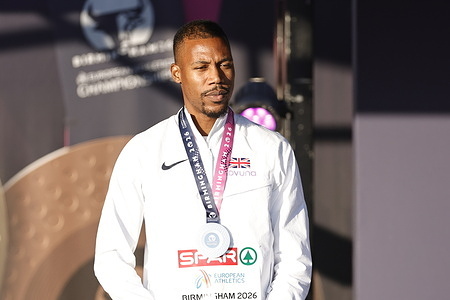 Zharnel Hughes of Great Britain in the medal ceremony of the Men’s 200m during day five of the 27th European Athletics Championships at Alexander Stadium.