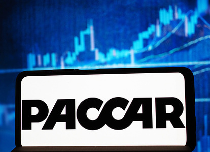 In this photo illustration, PACCAR Inc. logo seen displayed on a smartphone.