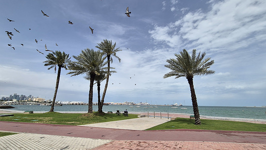 A man seen sitting on the Doha Corniche, Qatar.