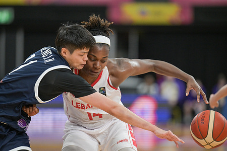 Cheng I-Hsiu (L) of Chinese Taipei Women Basketball team and Trinity Baptiste (R) of the Lebanon Women Basketball team seen in action during the FIBA Women's Asia Cup 2023 Division A match between Lebanon and Chinese Taipei held at the Quay Centre. Chinese Taipei vs Lebanon (FIBA Asia Cup Division A) Lebanon won 75 - 73.