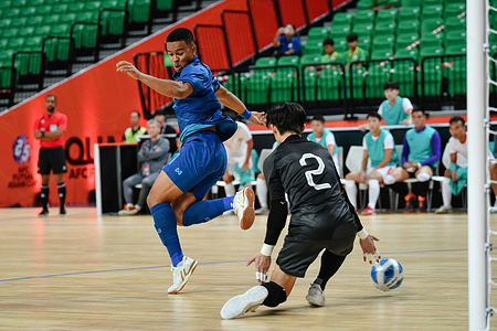 Muhammad Osamanmusa (C) of Thailand and Wong Tsz Ho (R) of Hong Kong seen in action during the AFC Futsal Asian Cup Thailand 2024 Qualifiers match between Thailand and Hong Kong at Bangkok Arena. Final score; Thailand 6:0 Hong kong.
