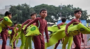 Marikina Sports Center,Marikina,NCR,Philippines, Marikina, NCR, Philippines - 11/12/2017: Elementary students carried their own hand crafted props that they made as their project in school.The Biggest Annual Philippine Rehiyon-Rehiyon Festival was once again celebrated this month with the theme “Unity In Diversity” which the main goal is to unite all individuals coming from different region in the nation. The festival showcases the diverse culture and attitudes of Filipinos around the country to bond as one in a big dance celebration. It serves as a tribute to local groups/community who came from other regions of the country and choose to stay and settle in the city.