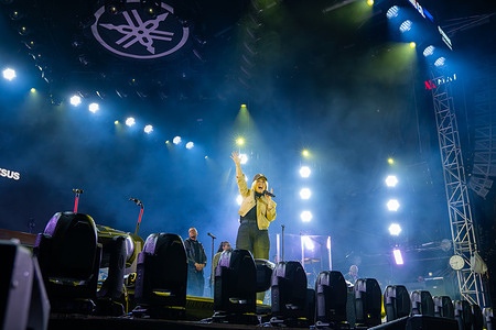 Natalie Grant performs on the Yamaha Grand Plaza Stage during the NAMM Show. Musicians and industry professionals gather at the NAMM Show at the Anaheim Convention Center, where attendees test instruments, explore music technology, and interact across exhibition halls showcasing the global music industry.