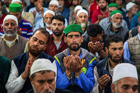 Kashmiri Muslims offer prayers at a mosque in Charar-e-Sharief Budgam on the night of Shab-e-Qadr, the 27th night of the Holy month of Ramadan. The Night of Power (Shab-e-Qadr or Lailat-ul-Qadr) is the holiest night in the Islamic calendar. On this night, Muslims believe that the Islamic Holy book Quran's first verses were revealed to the Prophet Mohammad. The Quran states: ''The Night of Al-Qadr is better than thousand months. Meanwhile, Indian authorities in Kashmir decide not to allow Shab-e-Qadr and Jumat-ul-Vida (Last Friday Prayers of Ramadan) at the historic Jamia Masjid in Srinagar.