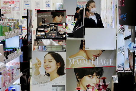 TOKYO, JAPAN - MAY 13, 2020: Employees wearing face masks as a preventive measure work at a cosmetics store amid coronavirus crisis.
The Ministry of Health, Labor and Welfare in Japan is set to introduce an online system to manage information on novel coronavirus patients in an integrated fashion, in a bid to reduce the burden on public health centers and to enhance patient support.