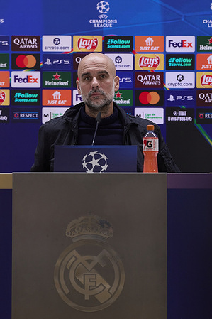 Josep ‘Pep’ Guardiola, the head coach of Manchester City, attends a press conference at Santiago Bernabeu stadium, on the eve of the UEFA Champions League 2025/2026 Round of 16 first leg football match between Real Madrid CF and Manchester City.